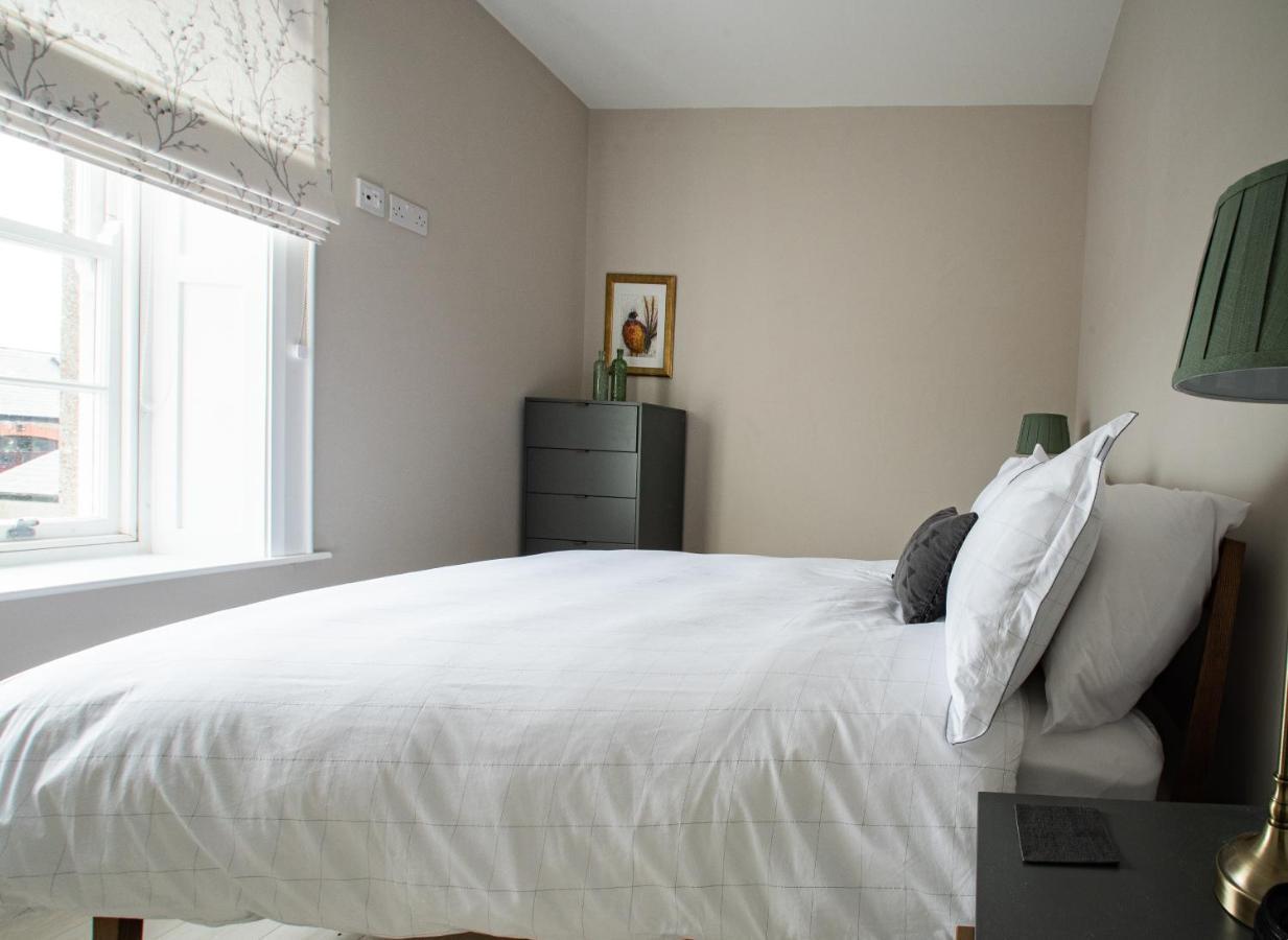 Heritage Cottages Dundrum Bagian luar foto